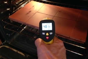 measuring oven pizza stone or tile temperature with the ennoLogic infrared thermometer in the kitchen for that perfect pizza